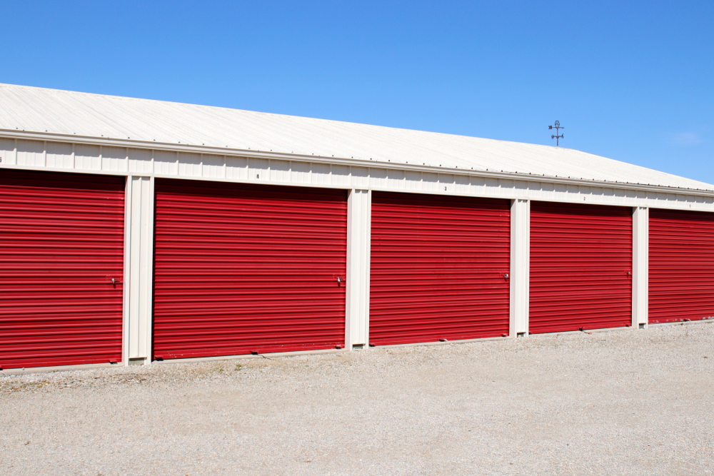 Drive up storage units with red doors