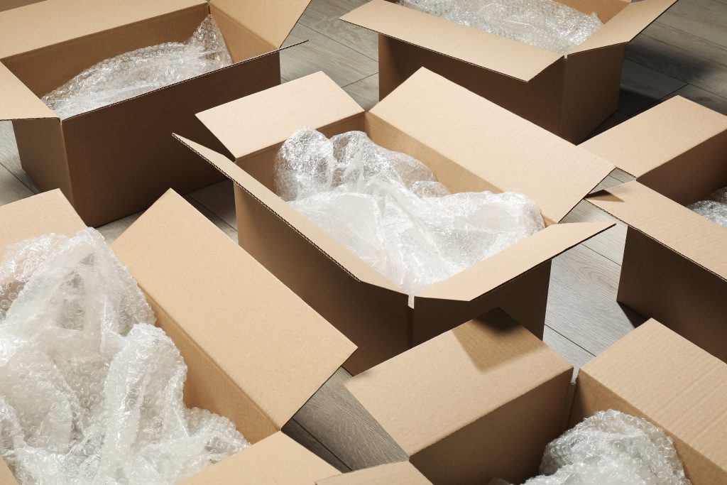 Cardboard boxes full of bubble wrap.