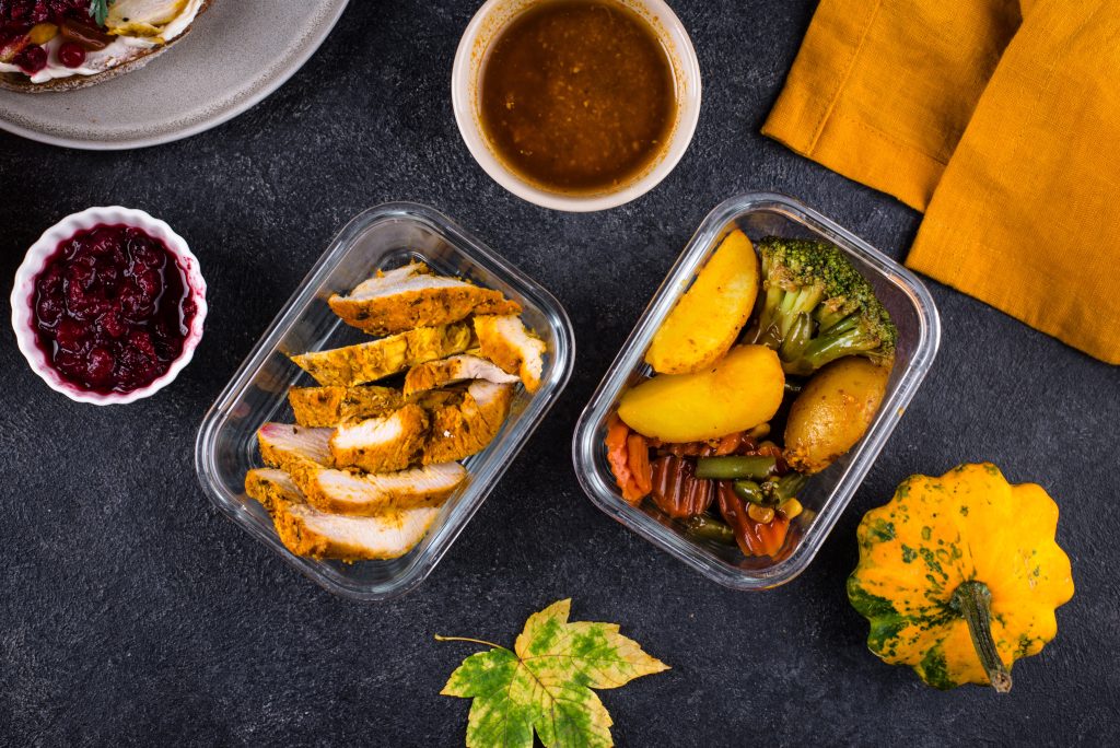 Thanksgiving leftovers in glass storage containers.