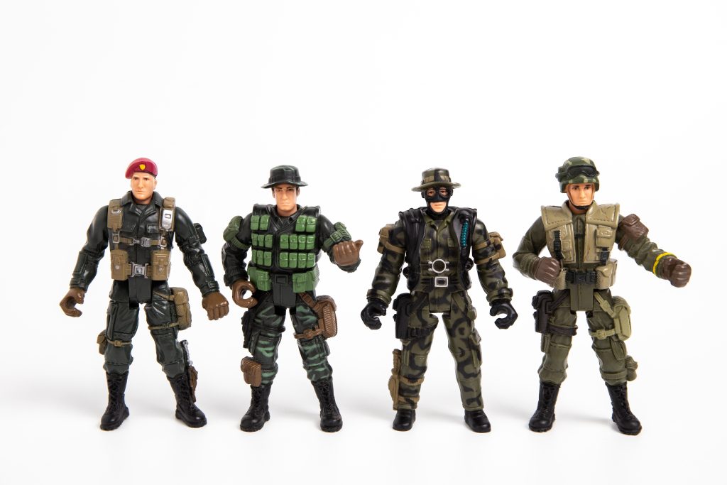 Four army action figures.